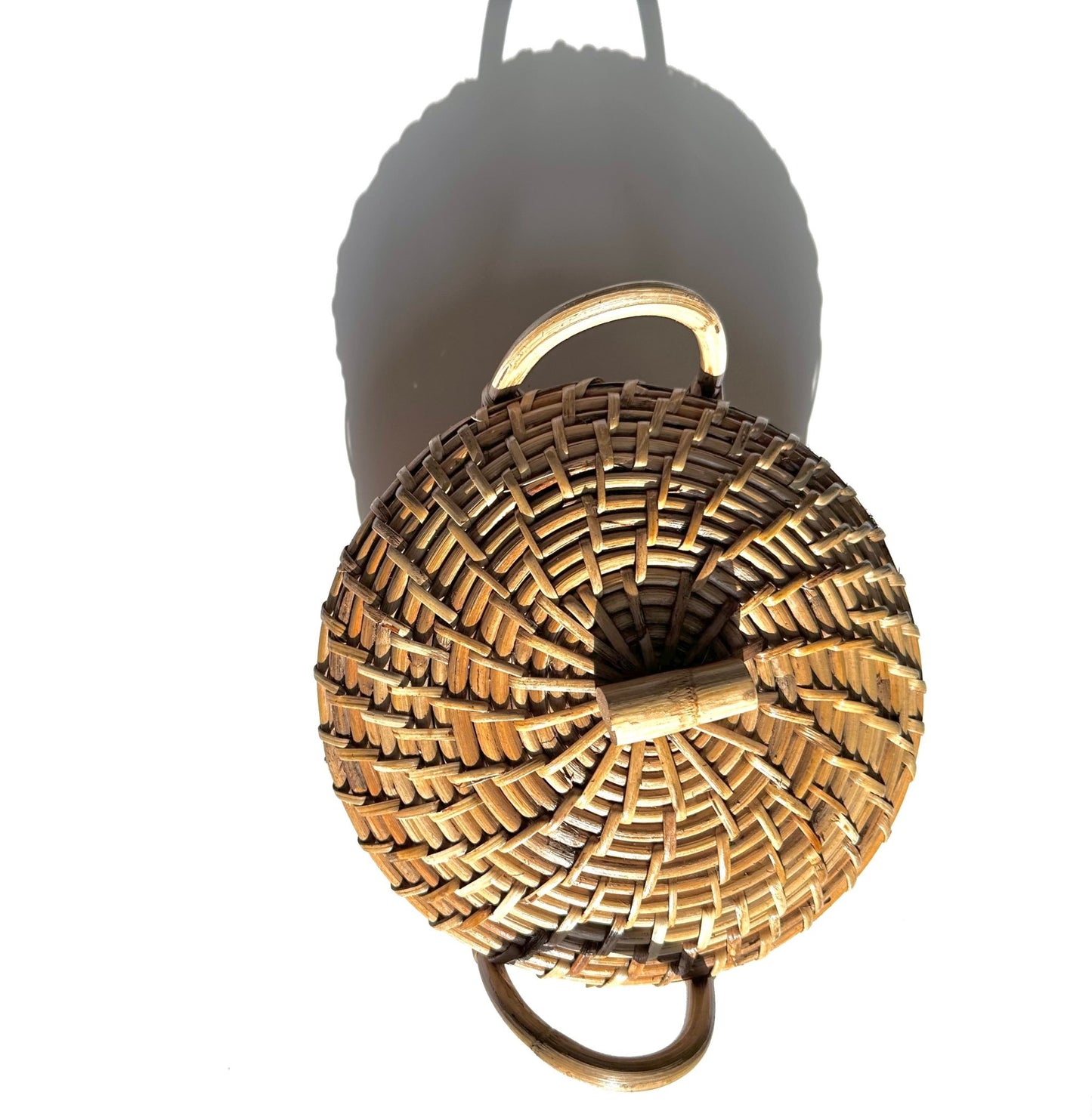 Cane roti box with handles and lid.