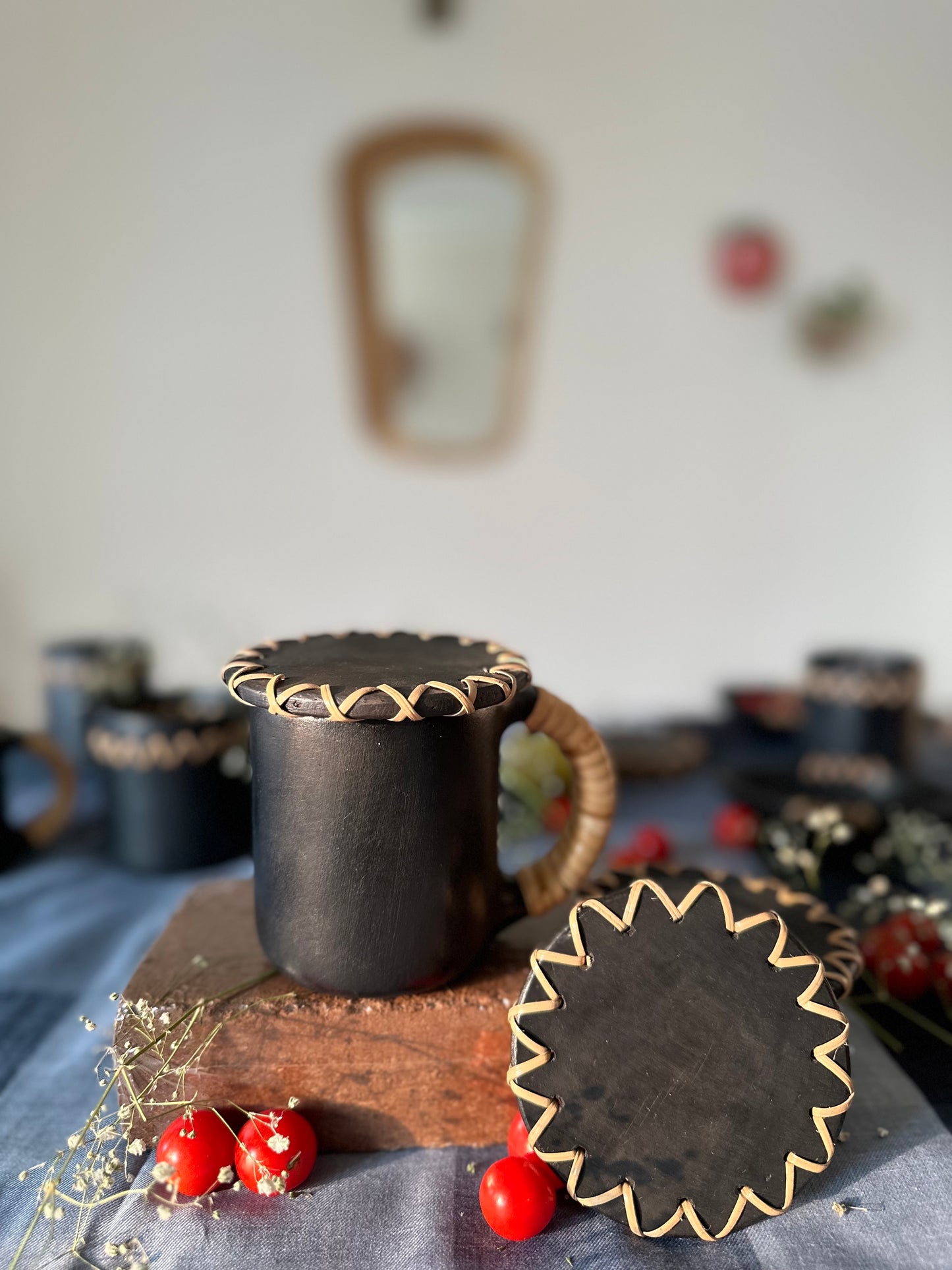 Black Pottery Cups and Coasters I Longpi set of 2 cups( Medium ) and 2 coasters.